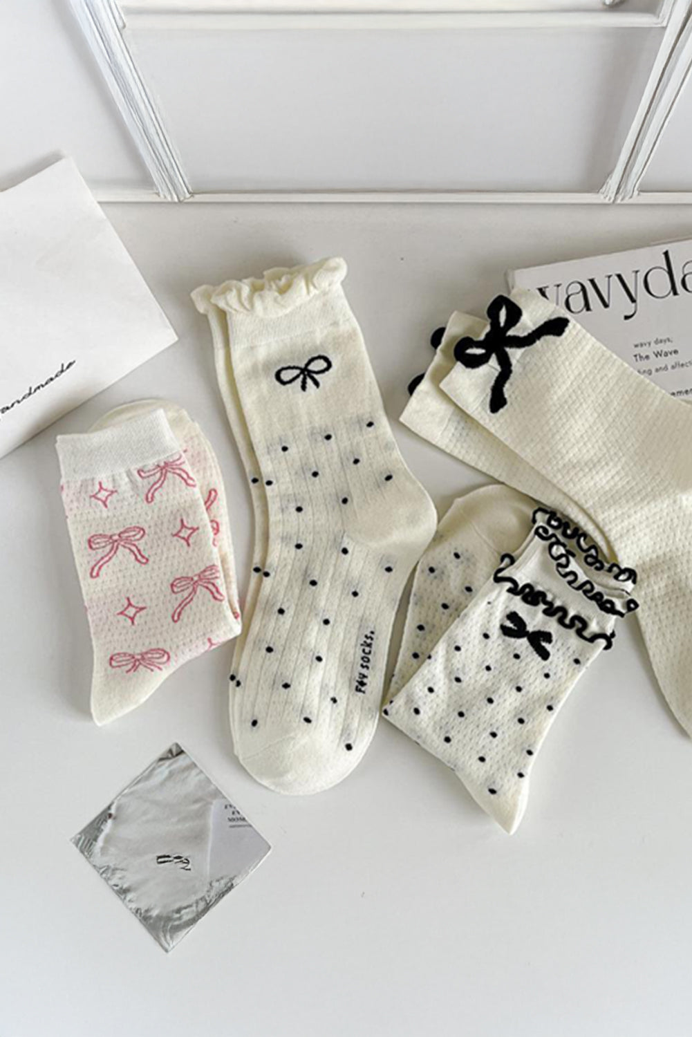 Chaussettes mi-mollet à imprimé nœud papillon