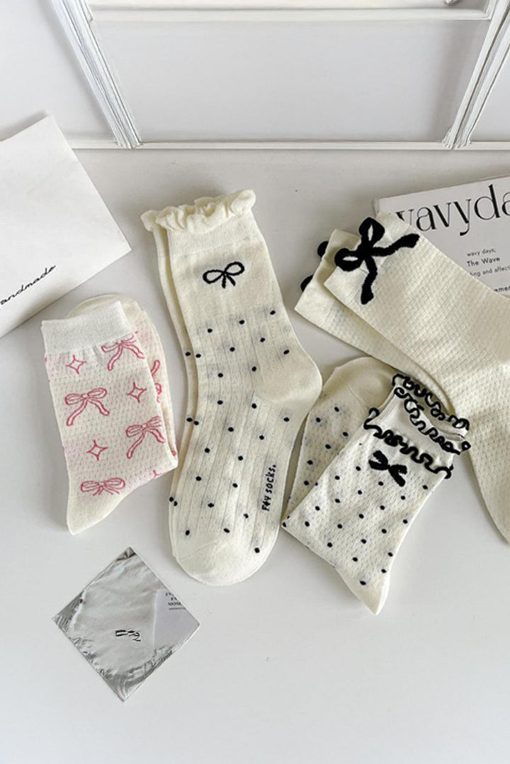 Chaussettes mi-mollet à imprimé nœud papillon