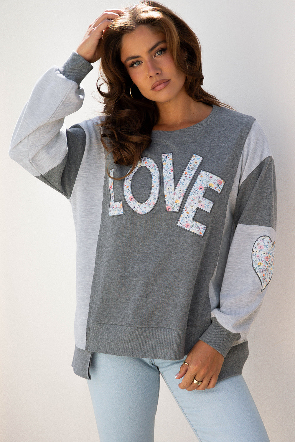 LOVE Graphic Exposed Seam Patchwork Uneven Hem Chic Sweatshirt