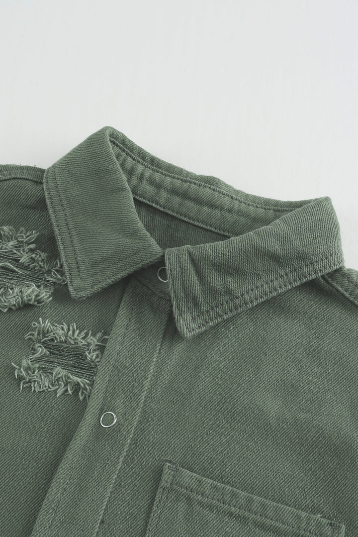 Veste en jean déchirée