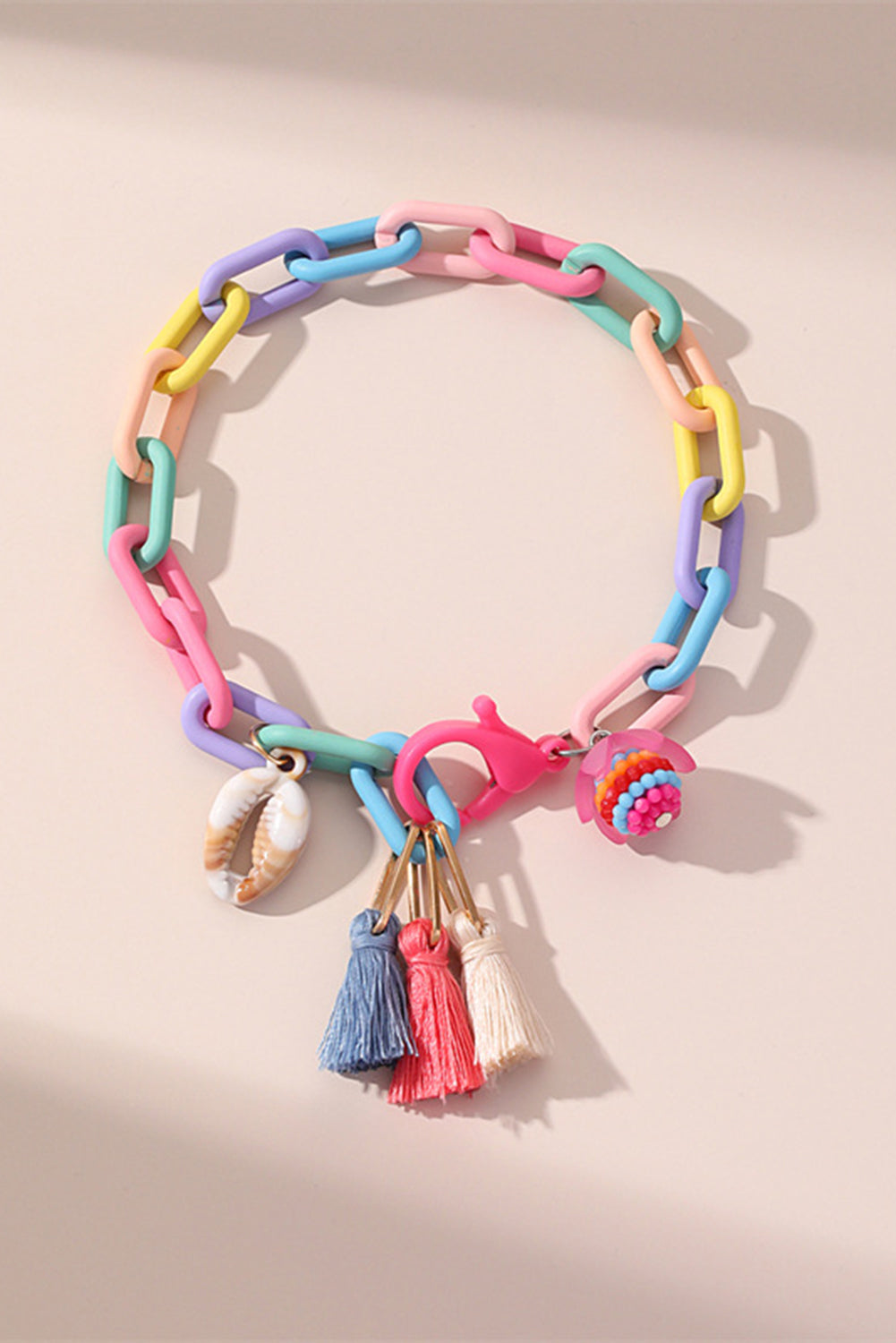 Bracelet de cheville réglable à maillons colorés avec pompon coquillage