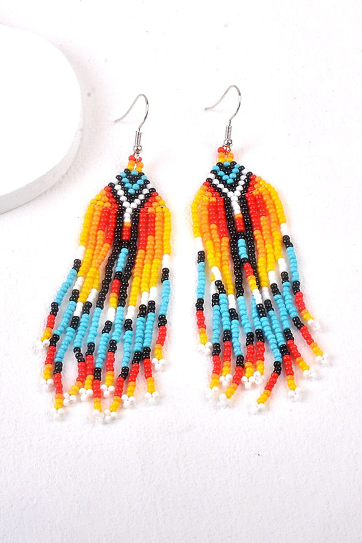 Boucle d'oreille à crochet et pompon en perles de riz occidentales