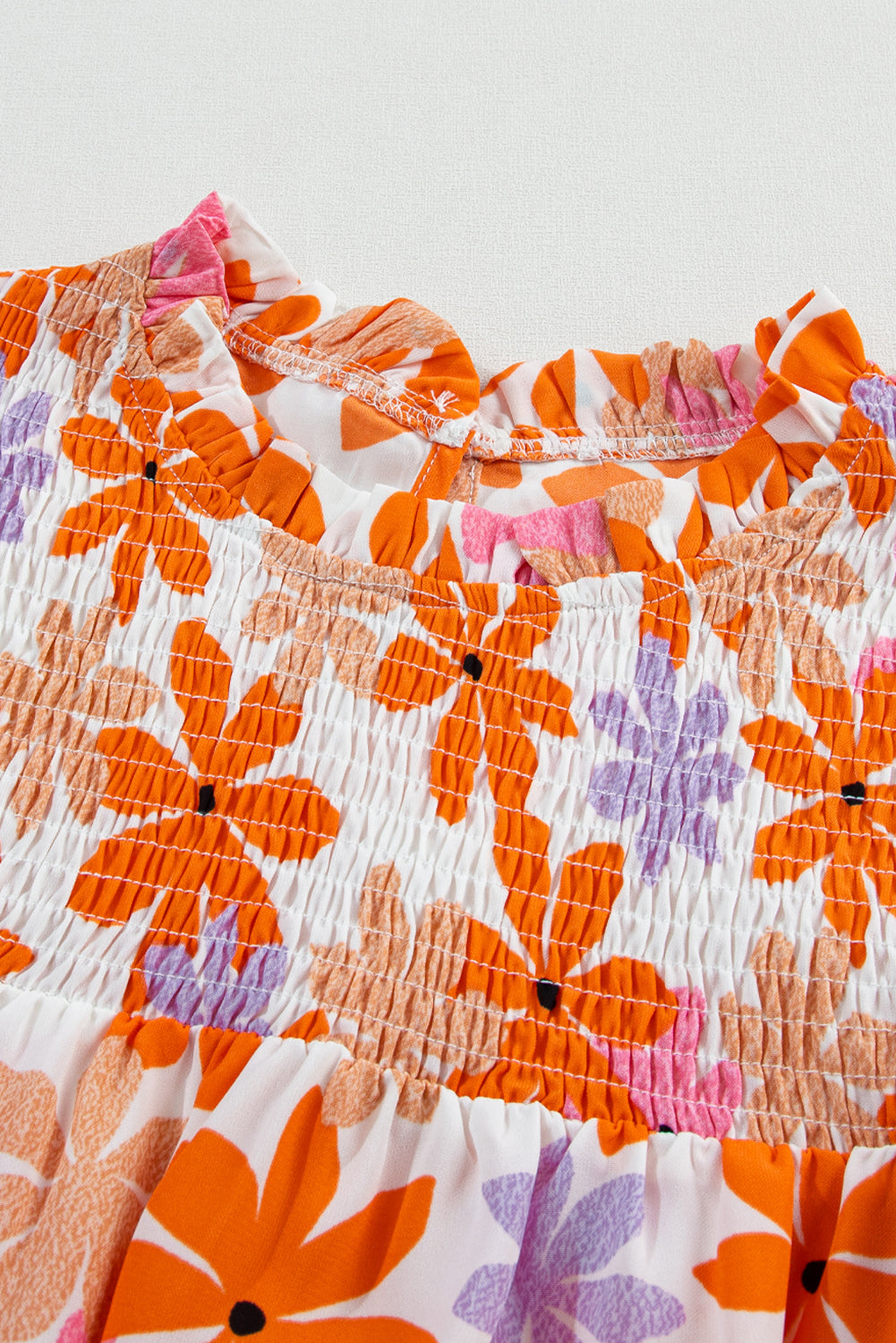 Ruffled Sleeve Smocked Floral Top