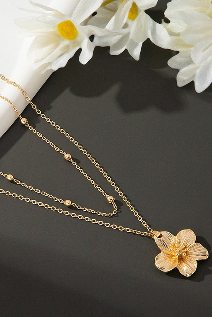 Collier double chaîne plaquée avec pendentif fleur et perles