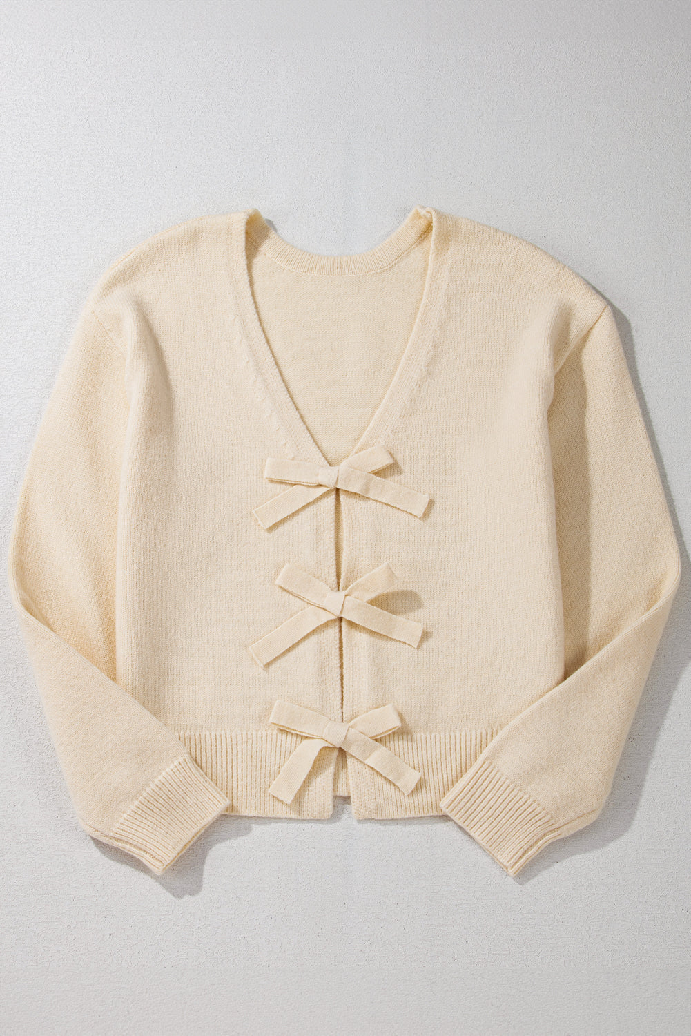 Jet Stream Bowknot Front Loose Knitted Cardigan