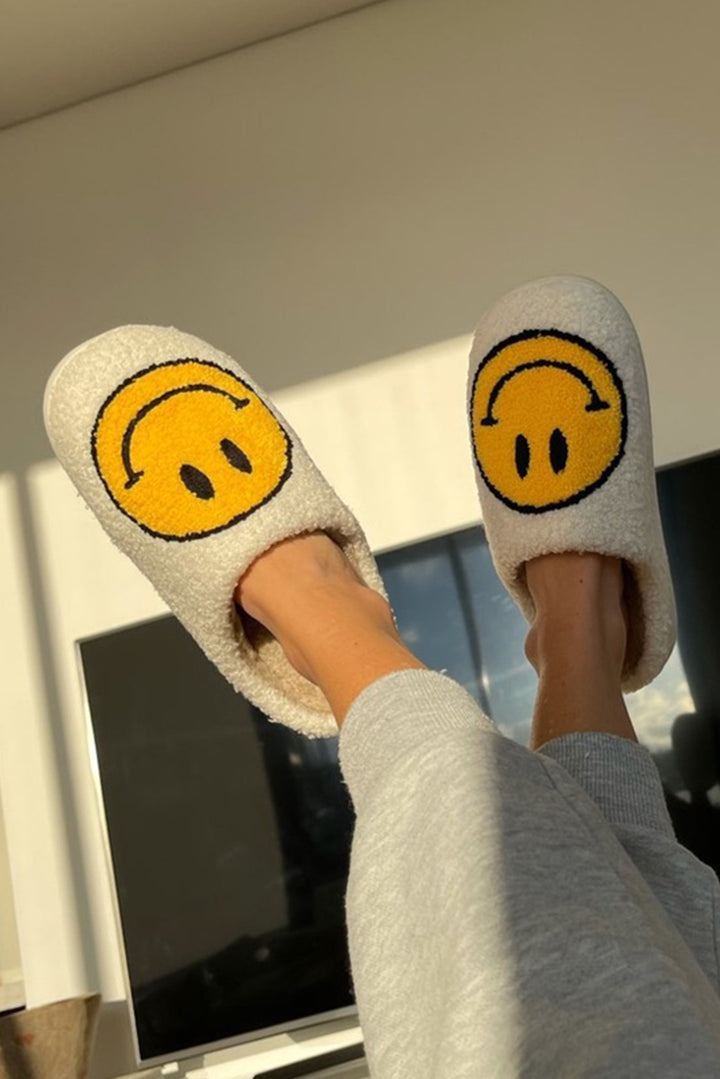 Chaussons antidérapants en peluche à imprimé visage souriant