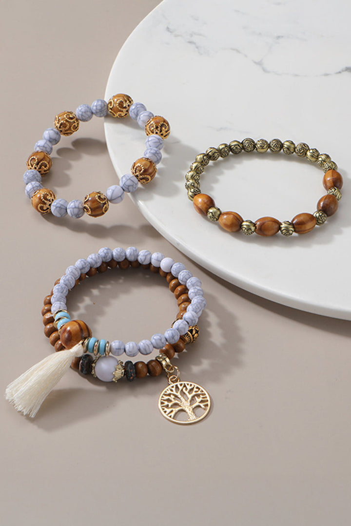 Ensemble de bracelets multicouches à pompons et perles style bohème