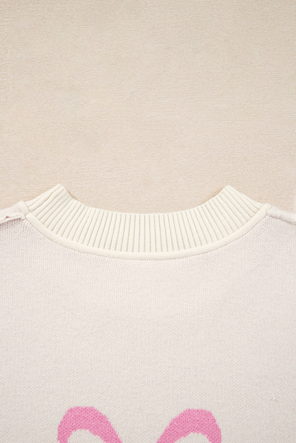 Pink Bow Print Ribbed Trim Exposed Seam Drop Shoulder Loose Sweater