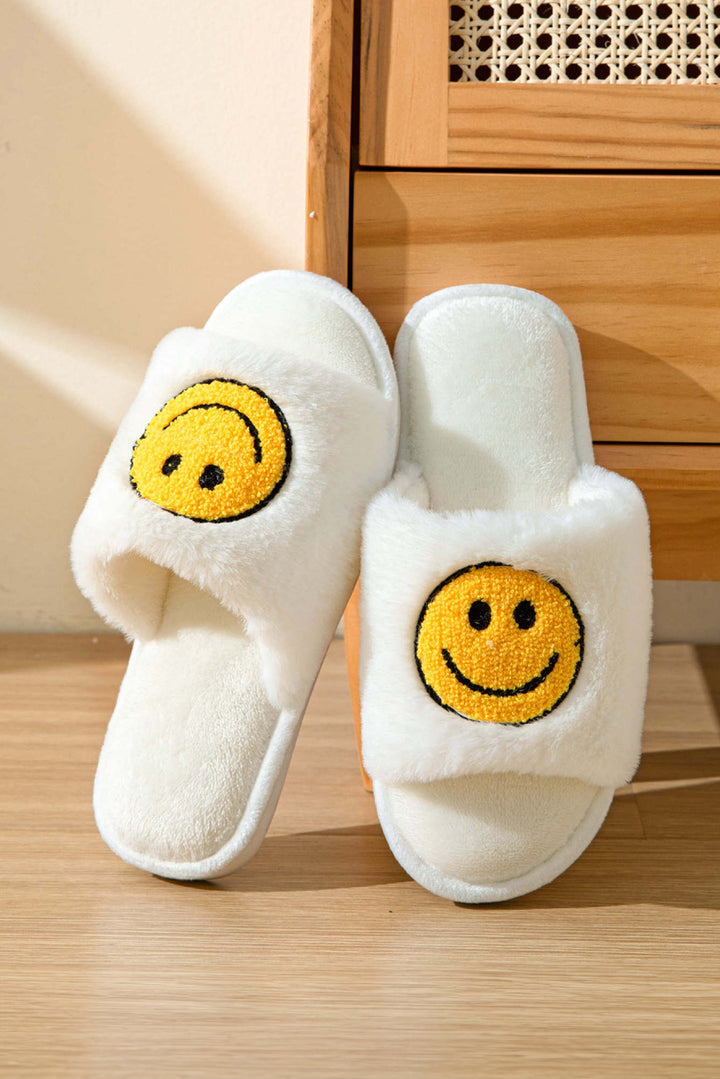 Plüsch-Hausschuhe mit Smiley-Grafik