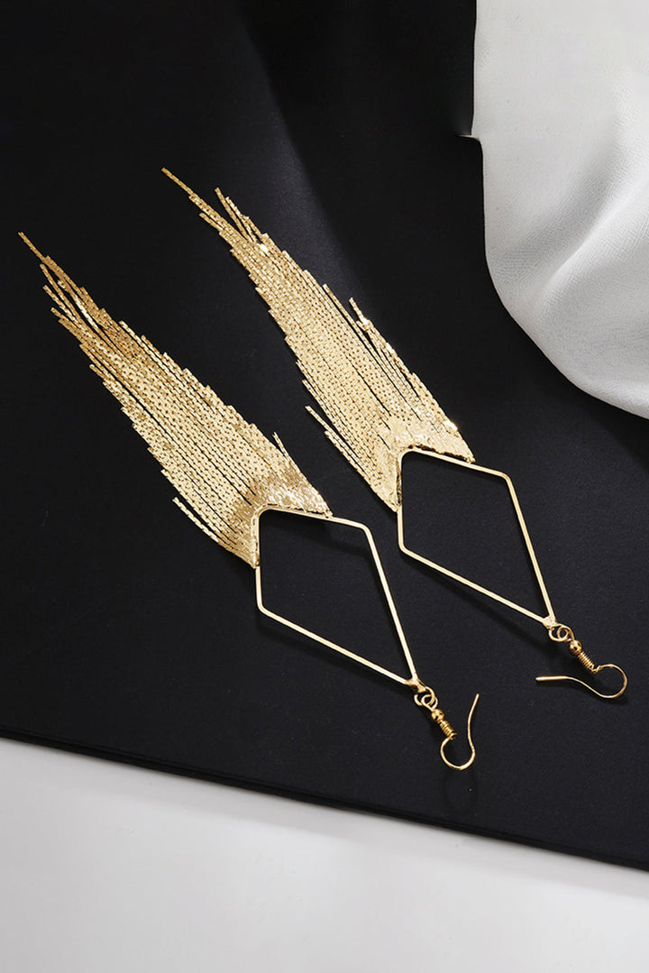 Boucles d'oreilles pendantes à longue chaîne et pompon