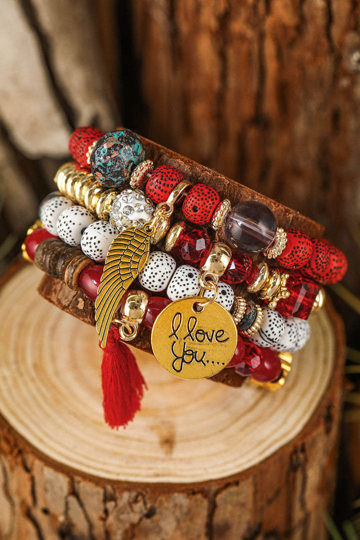 Ensemble de 4 bracelets bohèmes avec pendentifs en forme d'ailes et de disques
