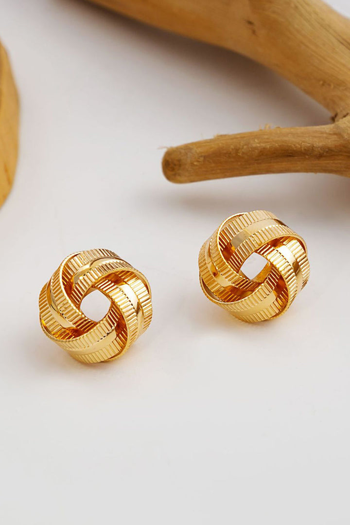Boucles d'oreilles à tige en forme de nœud texturé plaqué