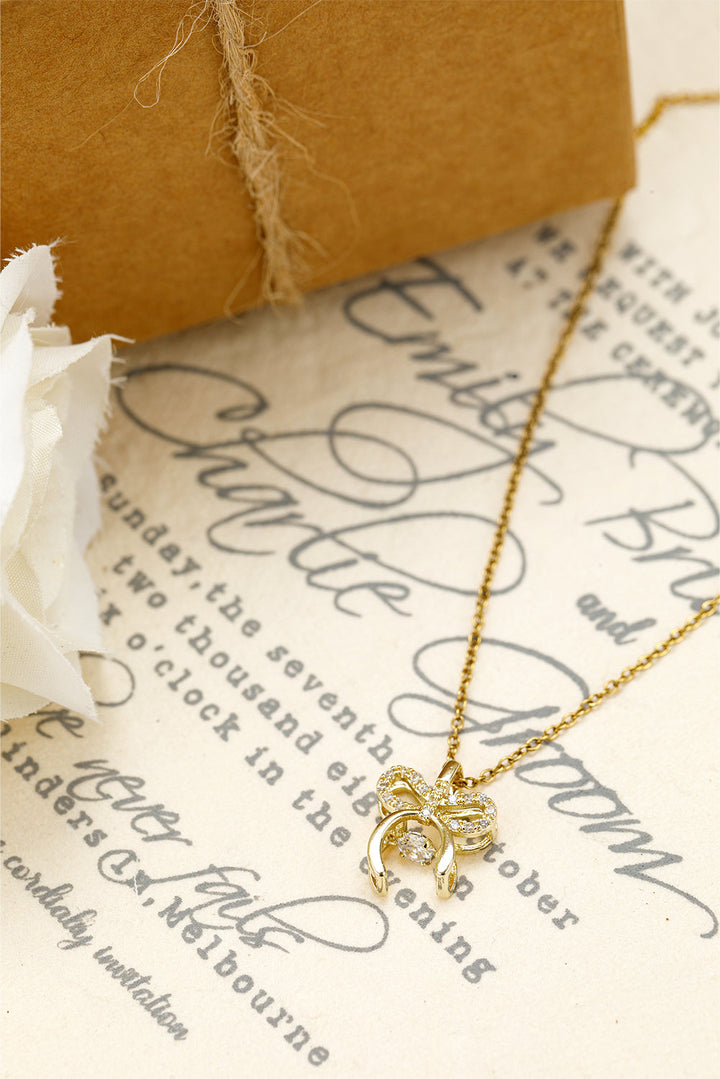 Collier en alliage plaqué avec pendentif nœud papillon en strass