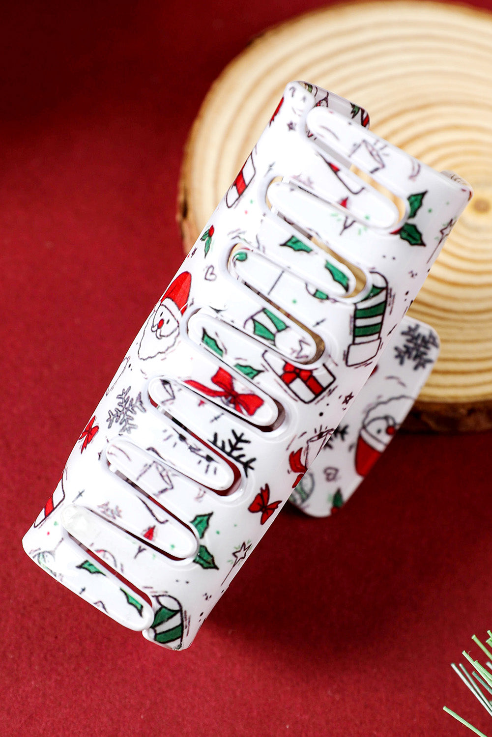 Pince à cheveux découpée avec motif de Noël