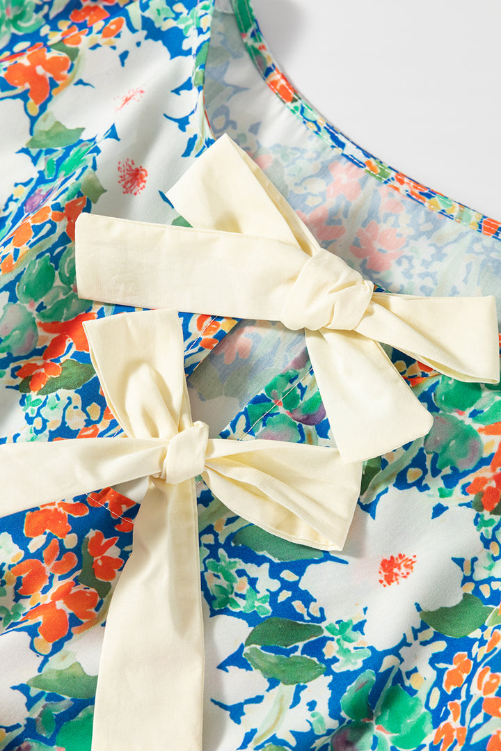 Floral Print Bow Applique Slit Sleeveless Peplum Blouse