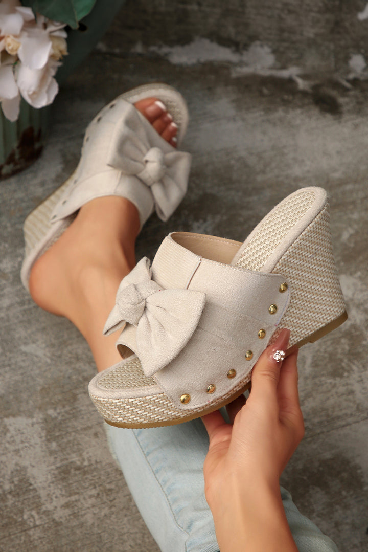 Chaussons compensés tissés en faux daim avec nœud décoratif