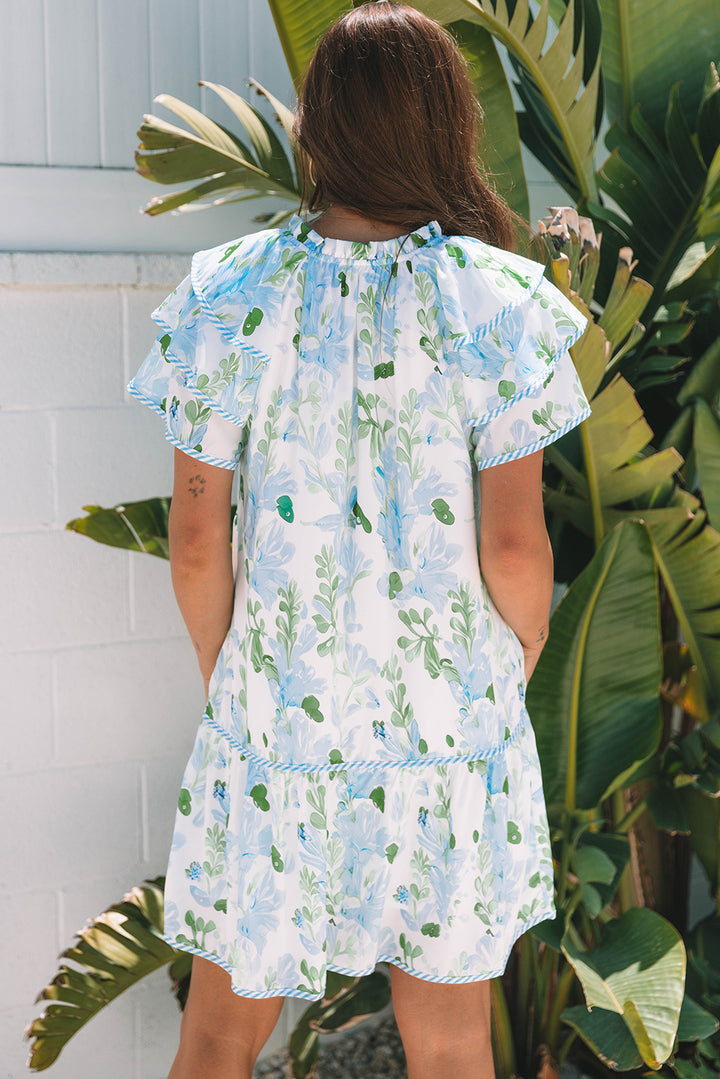Jolie mini-robe à manches courtes superposées à fleurs bleu ciel