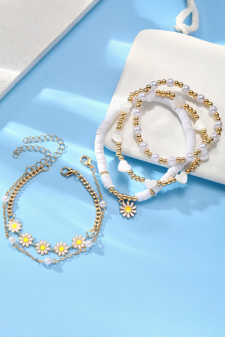 Mehrlagiges Armband-Set mit Gänseblümchen-Herzperlen