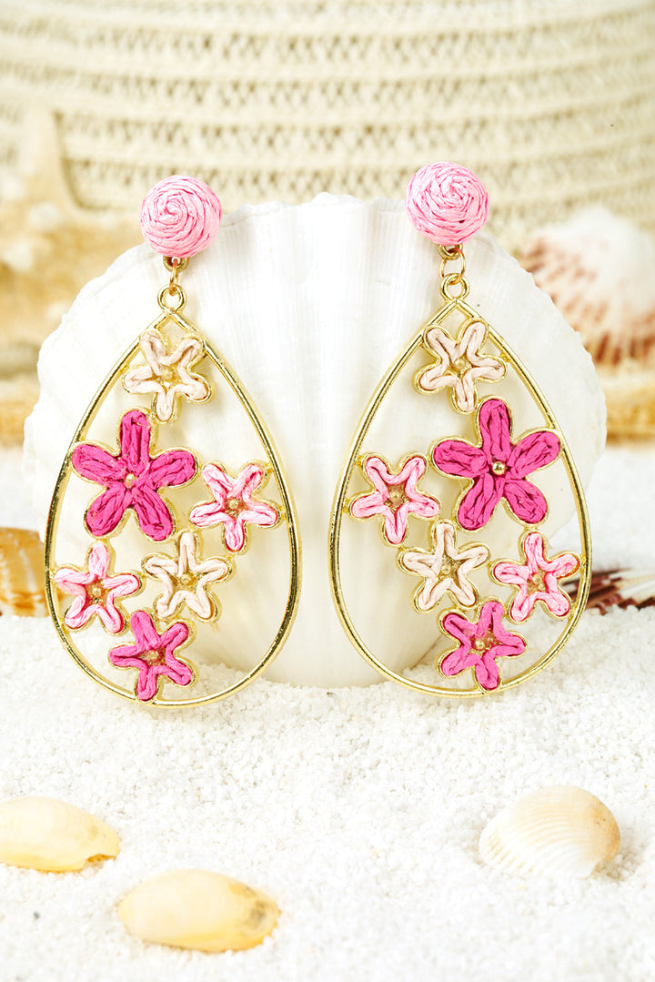 Geflochtene, vergoldete Wassertropfen-Ohrringe mit Blumenmotiv