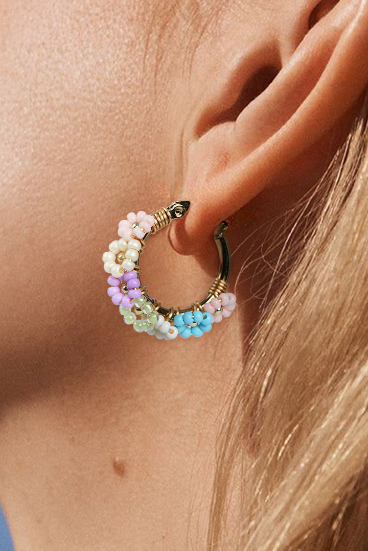 Boucles d'oreilles créoles en alliage avec fleurs perlées