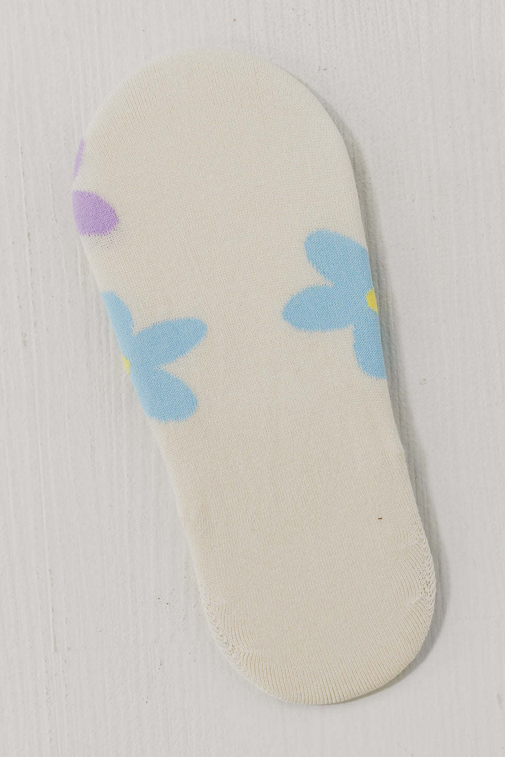 Niedliche Füßlinge mit Blumenmuster