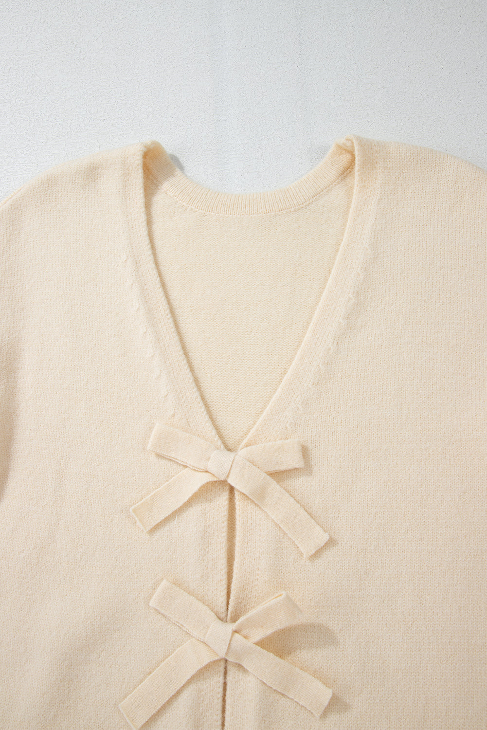 Jet Stream Bowknot Front Loose Knitted Cardigan