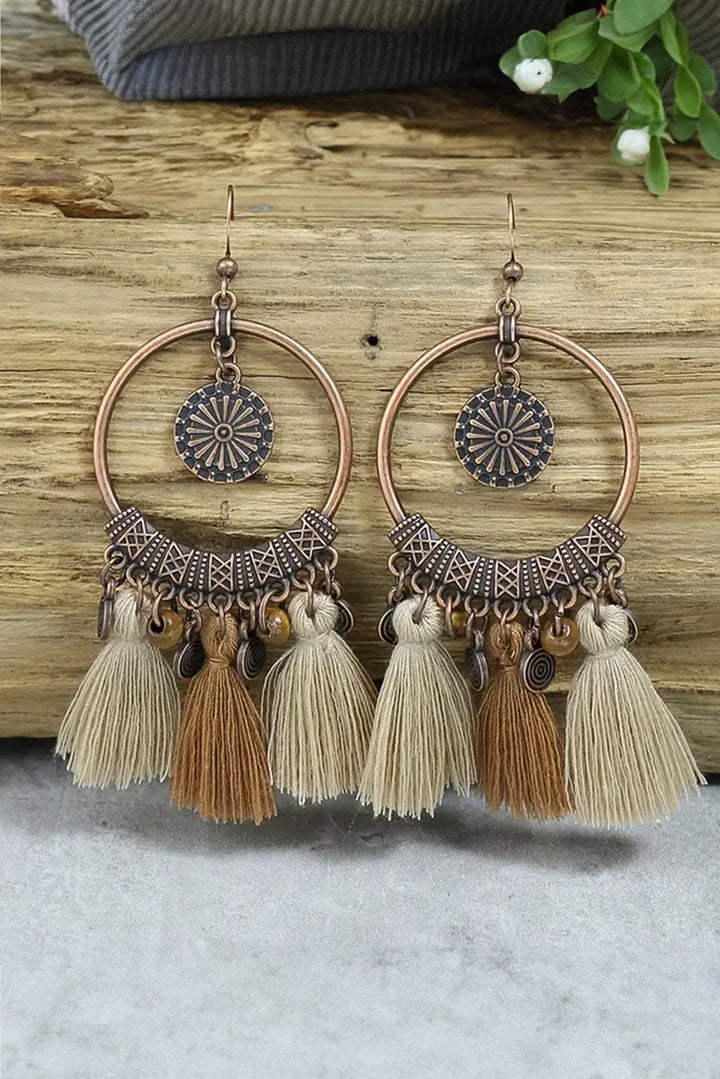 Boucles d'oreilles pendantes rondes à pompons style bohème