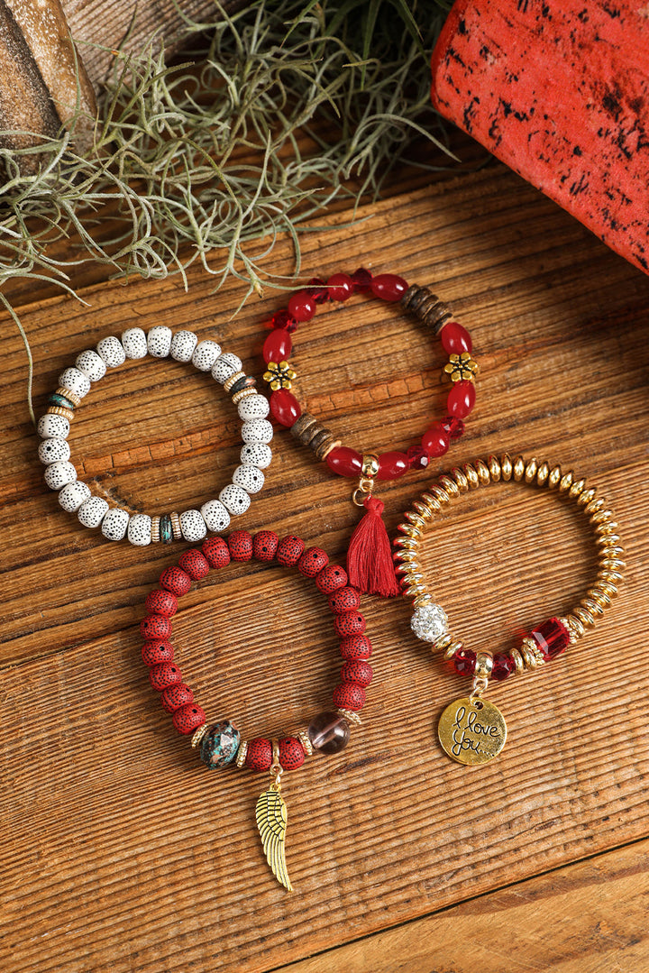 Ensemble de 4 bracelets bohèmes avec pendentifs en forme d'ailes et de disques