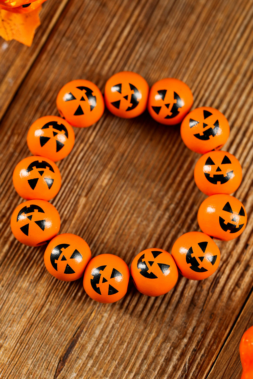 Bracelet de perles en forme de visage de citrouille d'Halloween