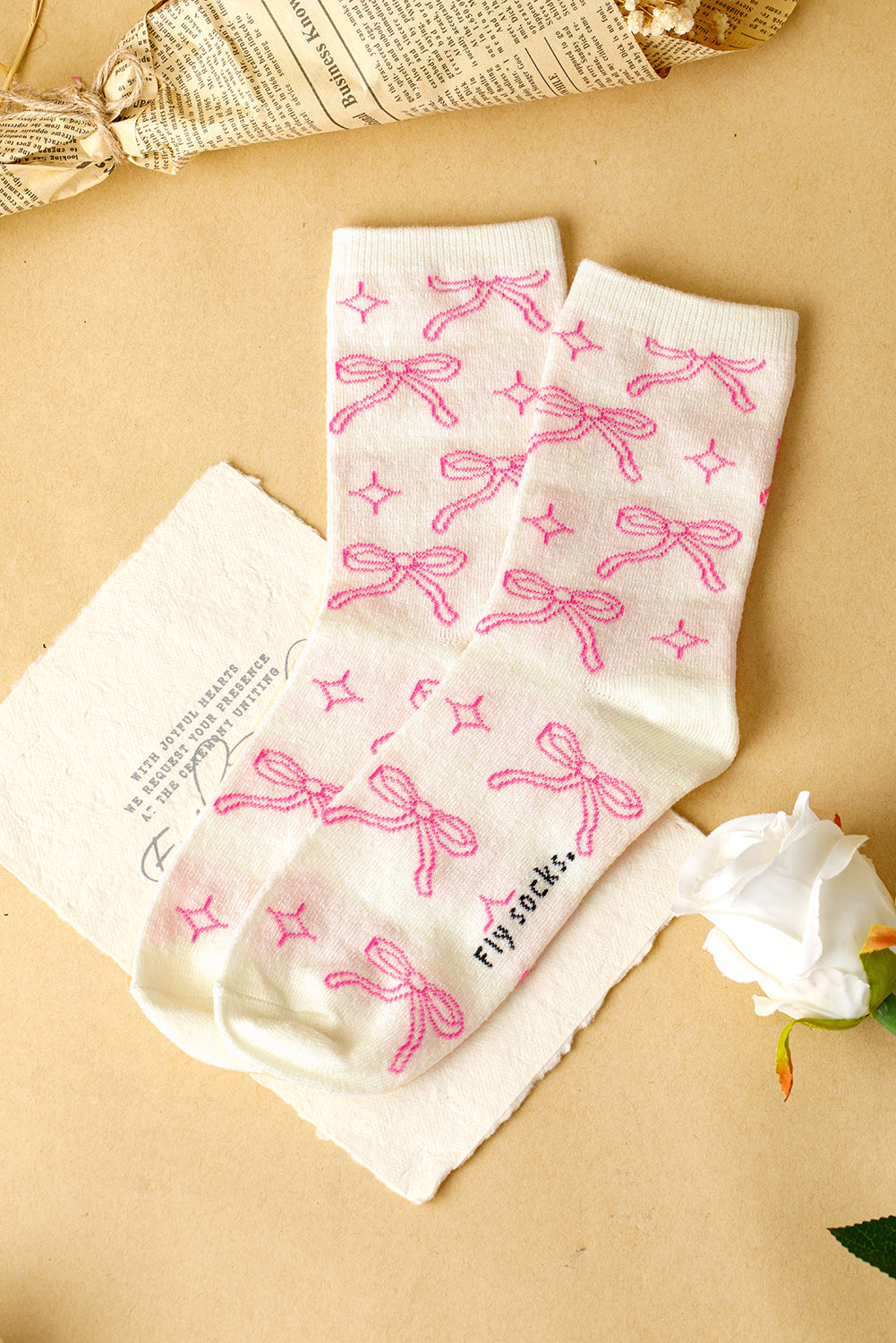 Chaussettes mi-mollet à imprimé nœud papillon