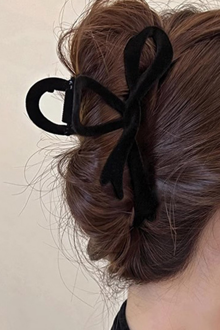 Grande pince à cheveux en velours avec nœud papillon