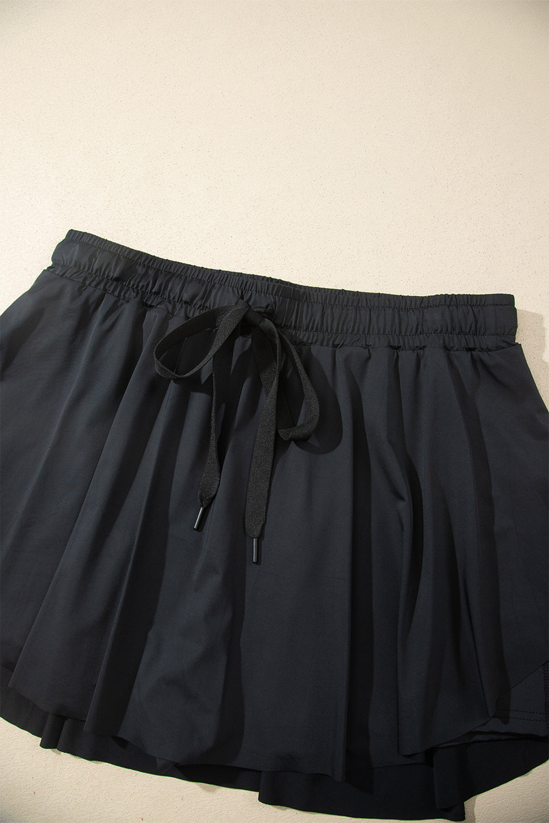 Black Plus Size Drawstring Waist Flared Tennis Skort