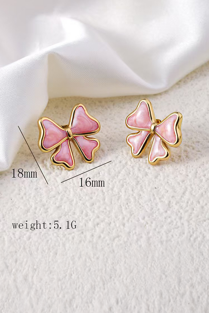 Boucles d'oreilles à tige en émail avec nœud papillon