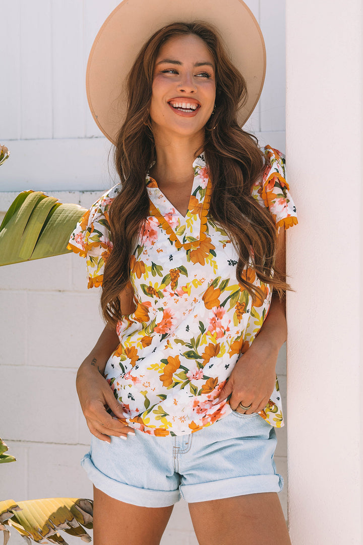 Ruffled V Neck Scalloped Short Sleeve Floral Blouse