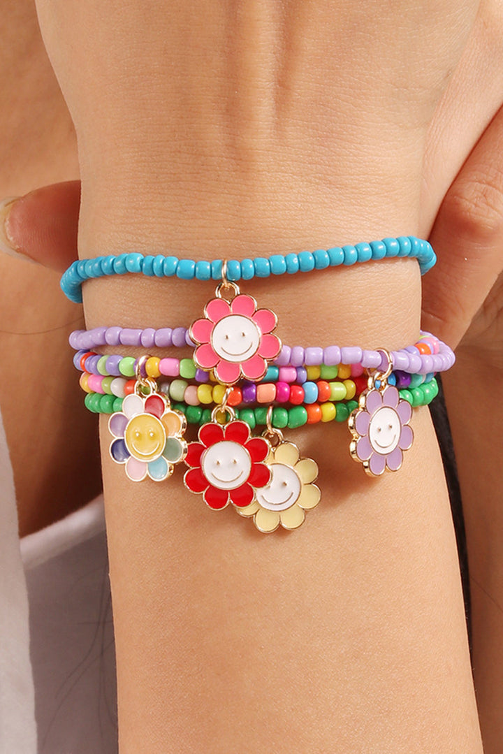 5-teiliges Perlenarmband-Set mit Smiley-Blumenanhänger