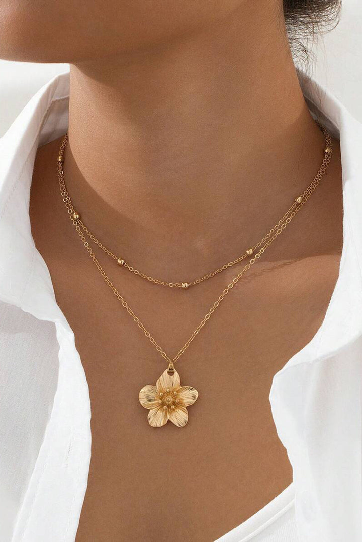 Collier double chaîne plaquée avec pendentif fleur et perles