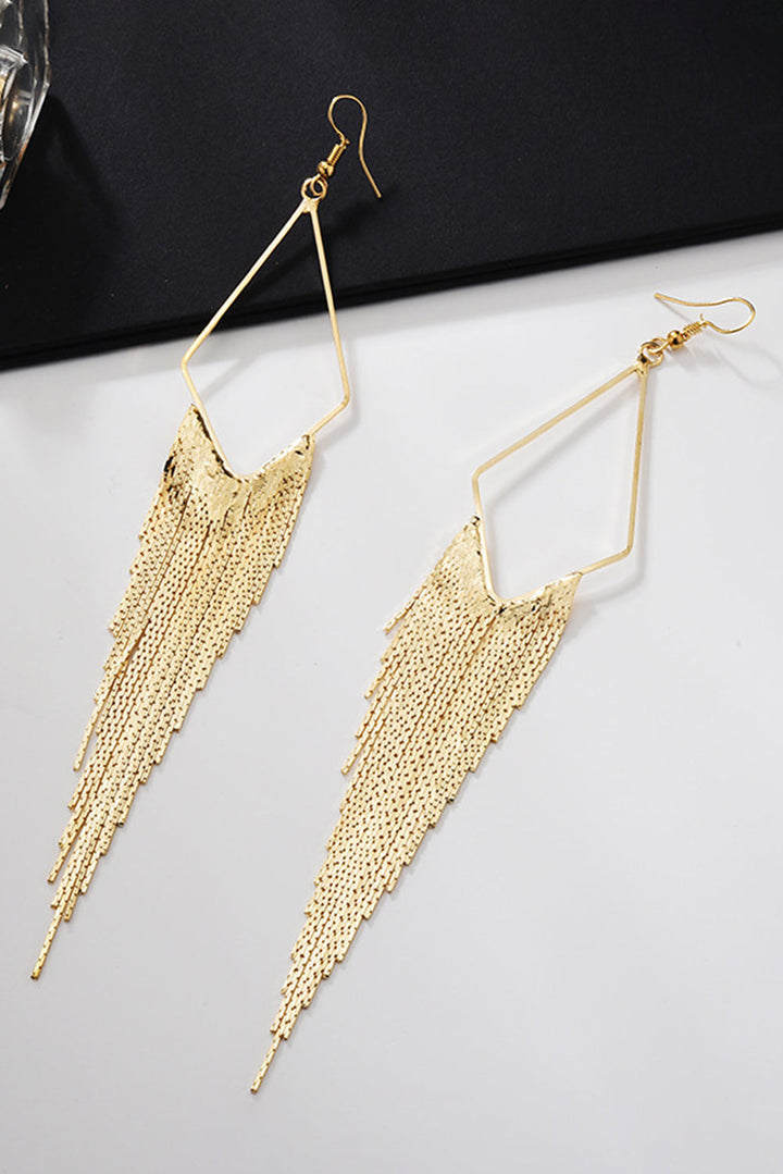 Boucles d'oreilles pendantes à longue chaîne et pompon