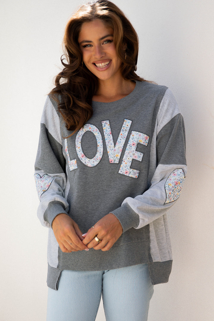 LOVE Graphic Exposed Seam Patchwork Uneven Hem Chic Sweatshirt