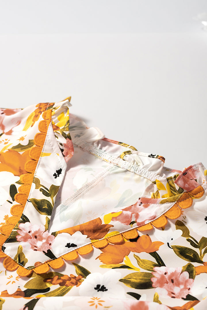 Ruffled V Neck Scalloped Short Sleeve Floral Blouse