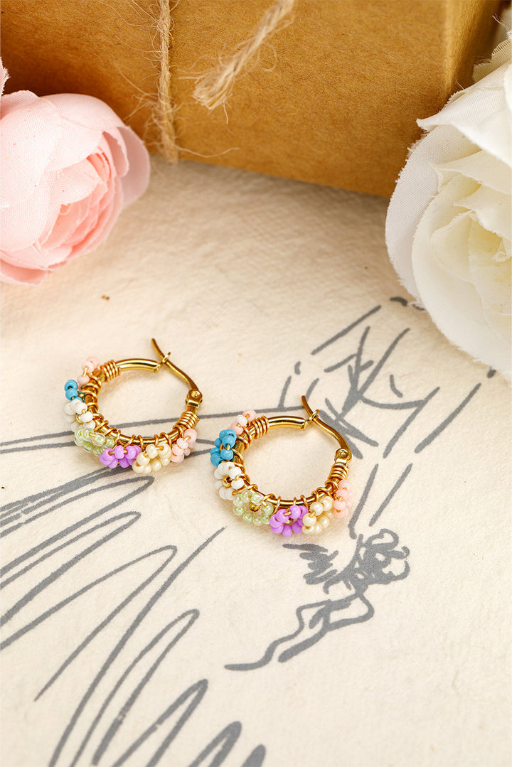 Boucles d'oreilles créoles en alliage avec fleurs perlées