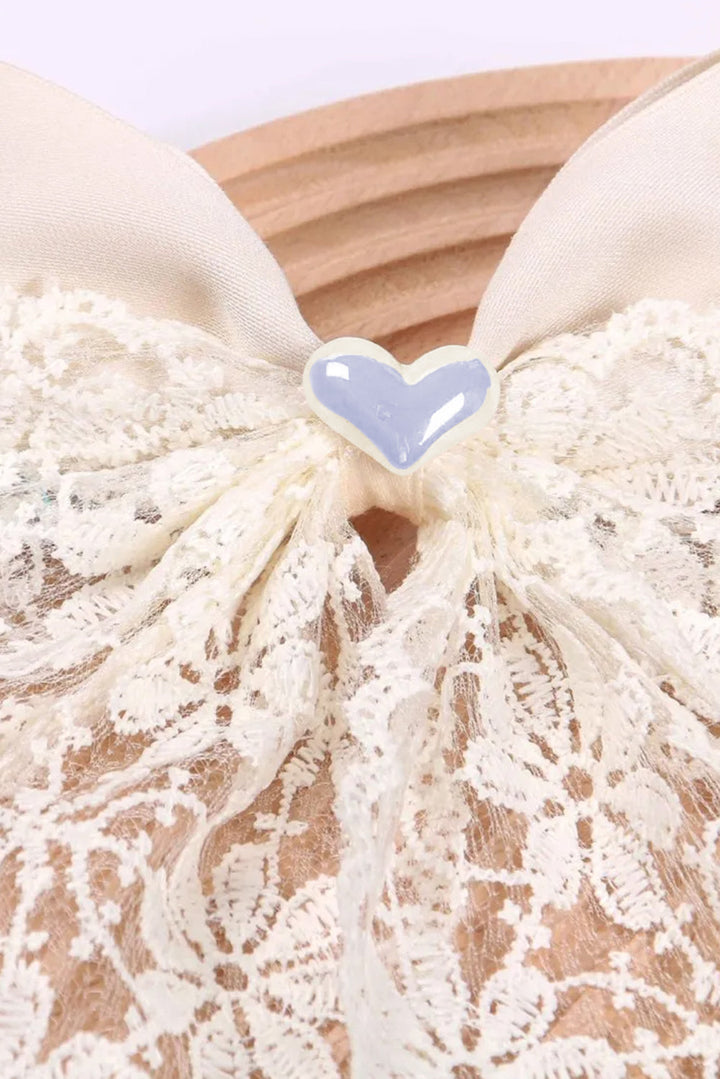 Barrette à cheveux en dentelle avec nœud en forme de cœur