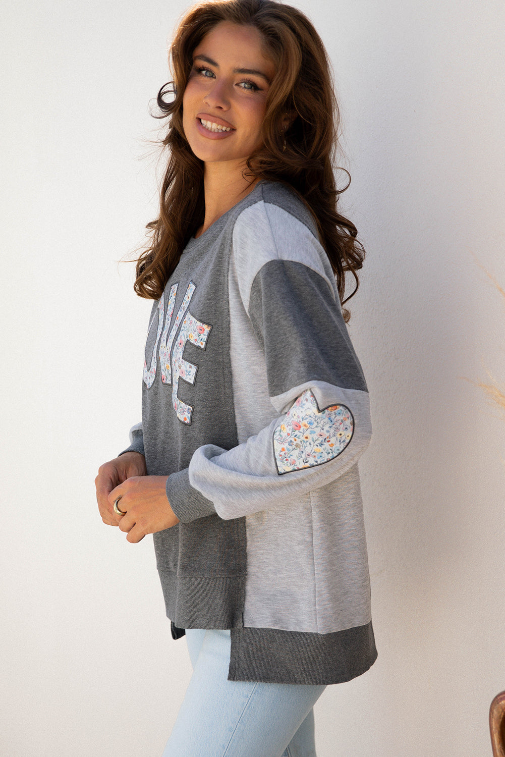 LOVE Graphic Exposed Seam Patchwork Uneven Hem Chic Sweatshirt
