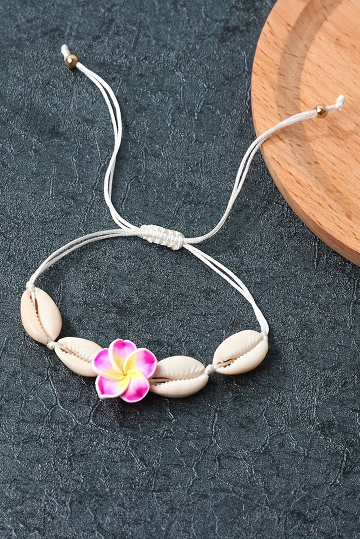 Bracelet ajustable en coquillage et fleurs