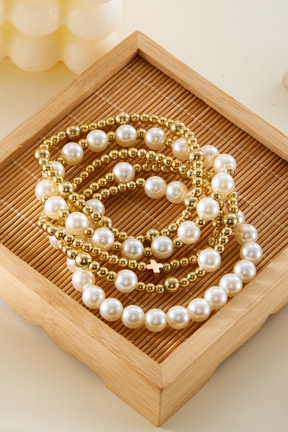 Bracelets multicouches en perles plaquées et décorées de perles croisées