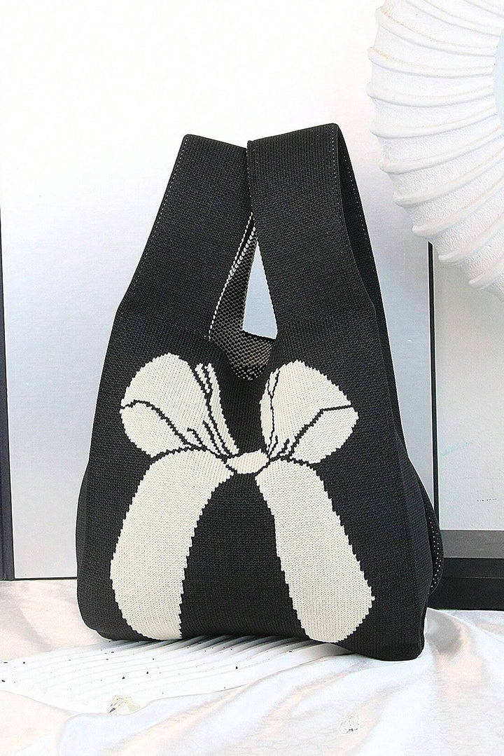 Sac à main tricoté à motif nœud papillon colorblock