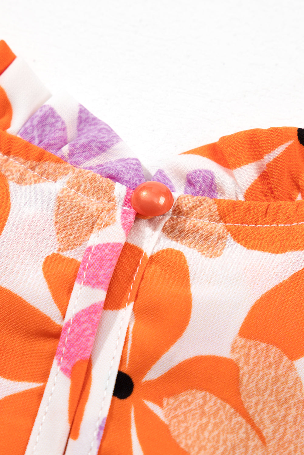 Ruffled Sleeve Smocked Floral Top