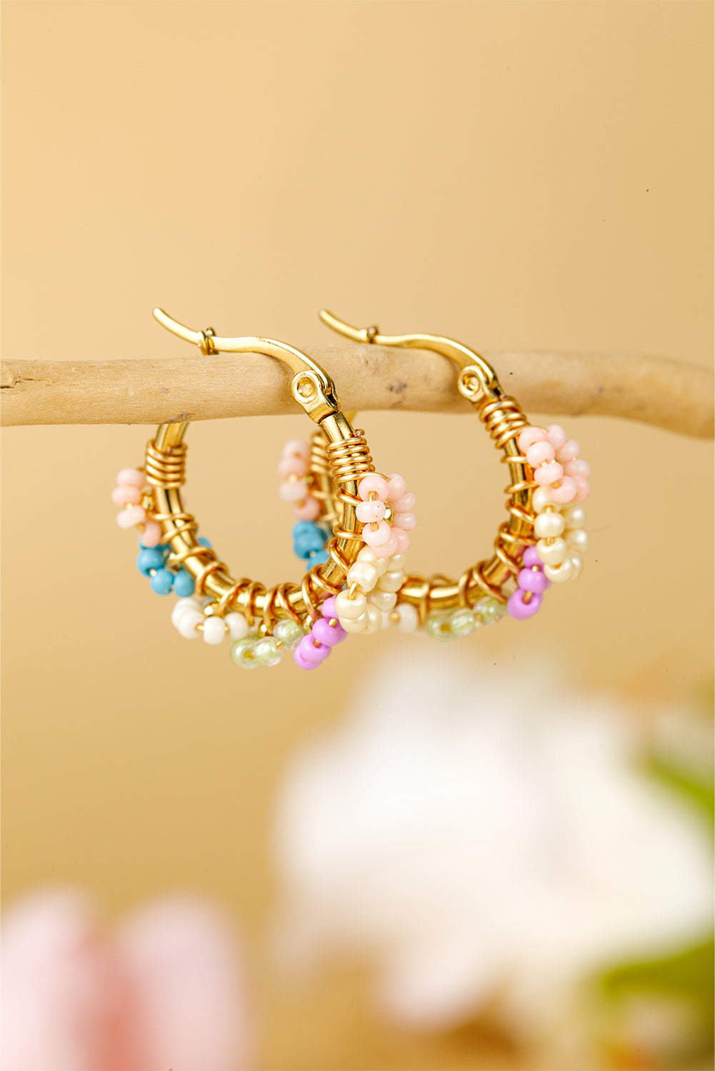 Boucles d'oreilles créoles en alliage avec fleurs perlées