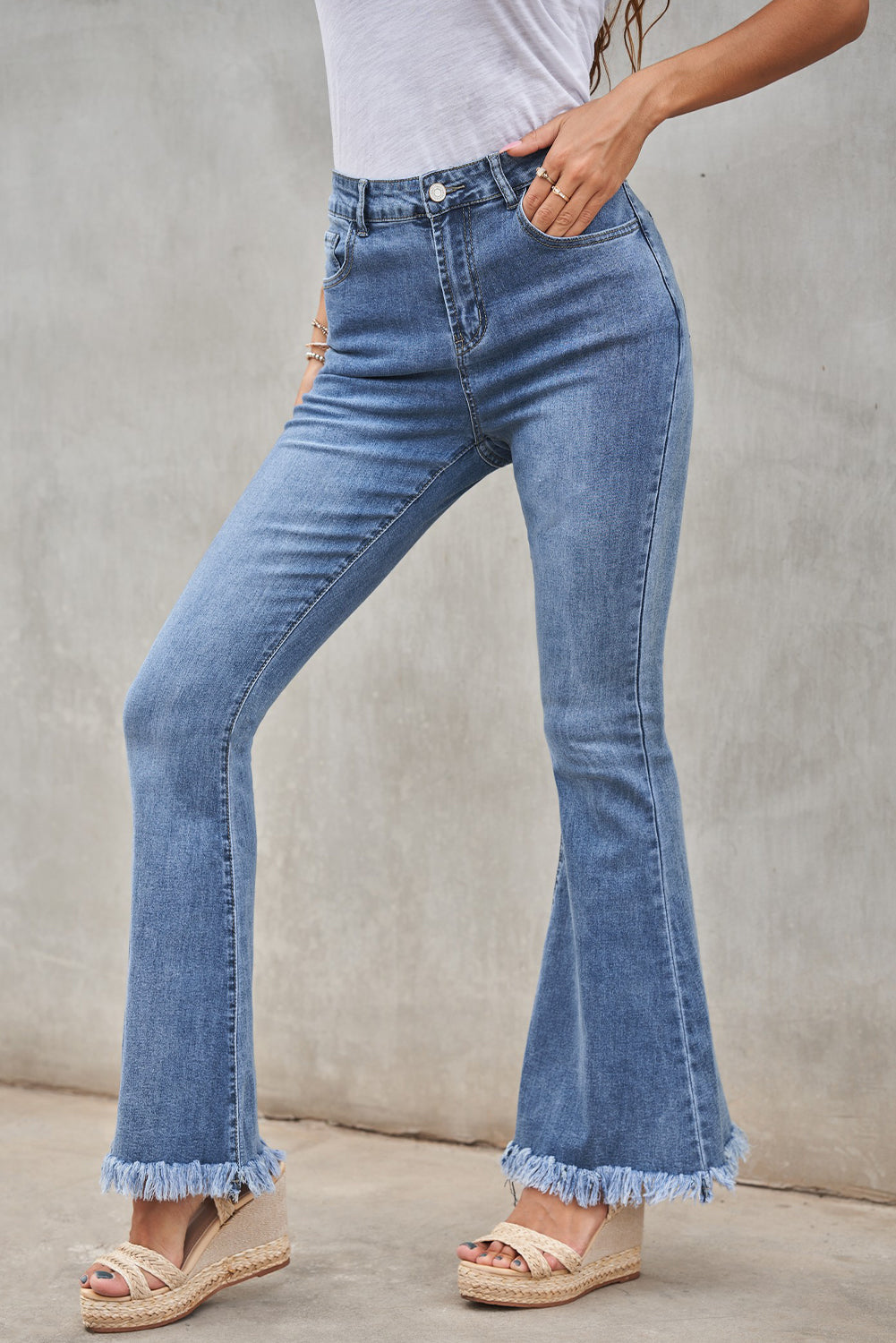 Women's Medium Washed High Waist Flare Jeans with Raw Edges